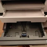 Fast, Vivid prints still tied to expensive ink.