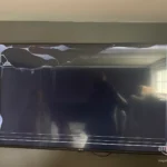 Broken TV with missing parts