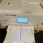 A few design flaws but it prints photos like a pro