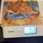 A few design flaws but it prints photos like a pro