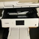 A few design flaws but it prints photos like a pro